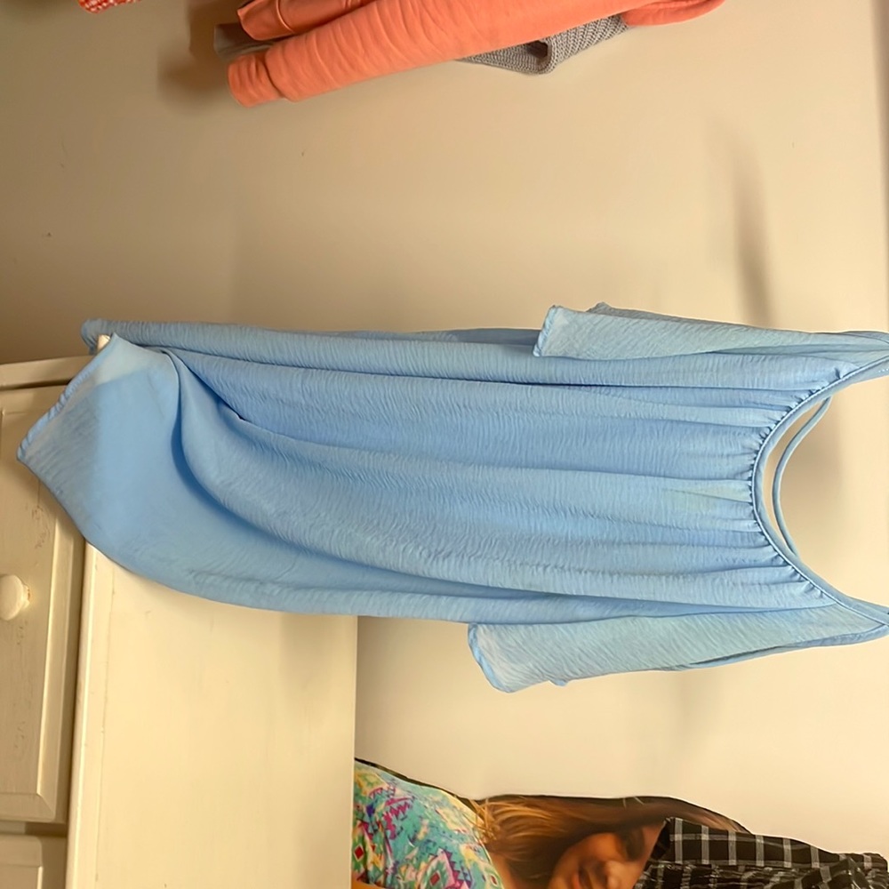Cute baby blue dress. Has a stain near the arm pit but no that noticeable